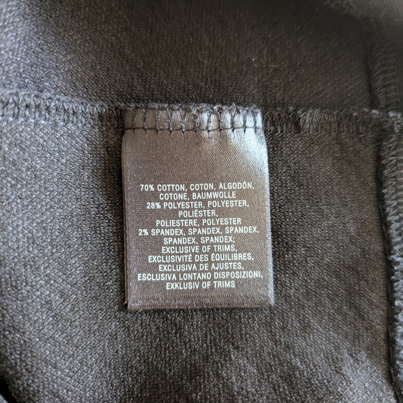 Chic Black Sleeveless Peplum Top - Picture 4 of 6